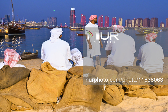 Traditional Arabic fishermen rest after a performance at the 14th Katara Traditional Dhow Festival at Katara Cultural Village in Doha, Qatar...