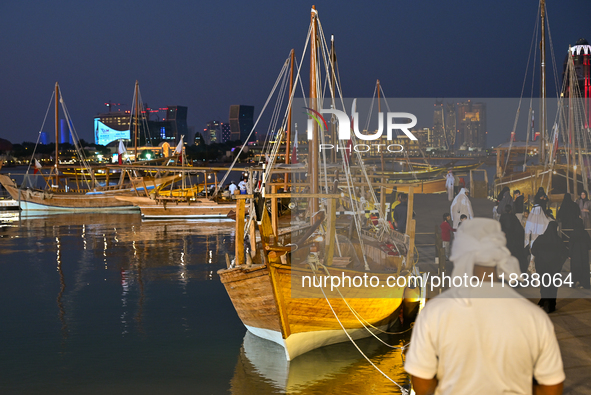 Traditional wooden dhows are on display during the 14th Katara Traditional Dhow Festival in Katara Cultural Village in Doha, Qatar, on Decem...