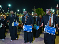 An Omani folk band performs during the 14th Katara Traditional Dhow Festival in Katara Cultural Village in Doha, Qatar, on December 5, 2024....