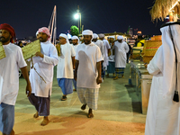 A group of traditional Arabic fishermen performs during the 14th Katara Traditional Dhow Festival in Katara Cultural Village in Doha, Qatar,...