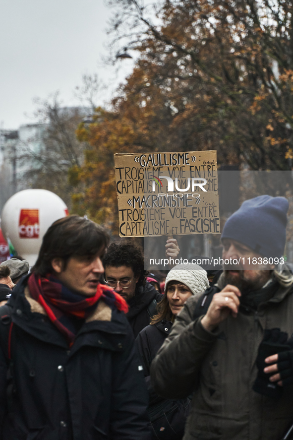 Protesters sign against President Macron, in Paris, France, on december 05, 2024. ( Tony Linke/NurPhoto)