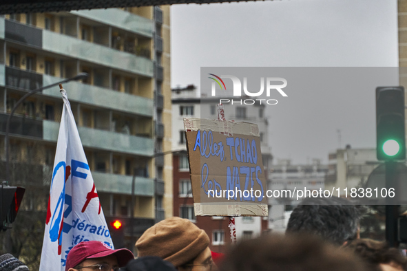 A sign of demonstration, in Paris, France, on december 05, 2024. ( Tony Linke/NurPhoto)