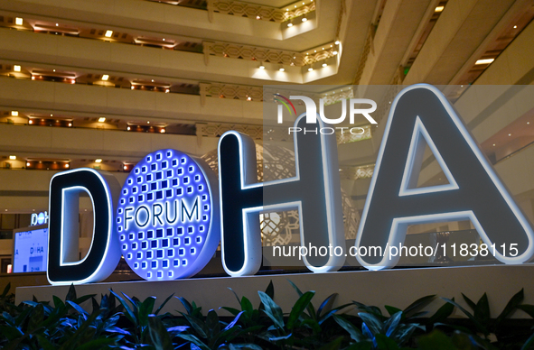 The Doha Forum logo is inside the Sheraton Grand Doha Resort & Convention Hotel in Doha, Qatar, on December 5, 2024, ahead of the 22nd editi...