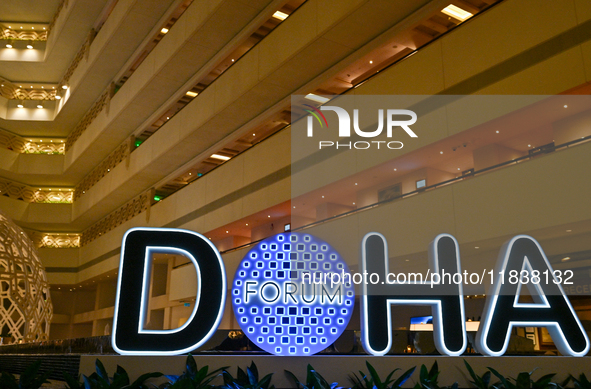 The Doha Forum logo is inside the Sheraton Grand Doha Resort & Convention Hotel in Doha, Qatar, on December 5, 2024, ahead of the 22nd editi...