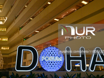 The Doha Forum logo is inside the Sheraton Grand Doha Resort & Convention Hotel in Doha, Qatar, on December 5, 2024, ahead of the 22nd editi...