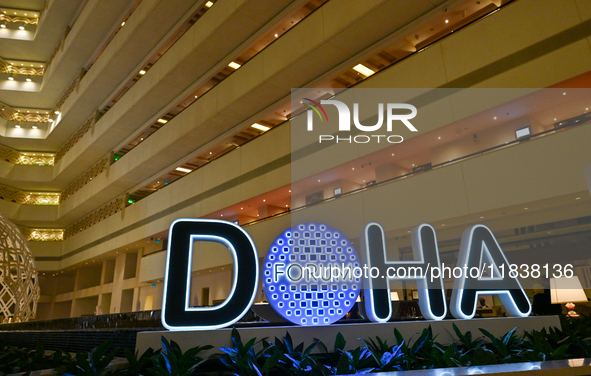 The Doha Forum logo is inside the Sheraton Grand Doha Resort & Convention Hotel in Doha, Qatar, on December 5, 2024, ahead of the 22nd editi...