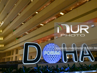 The Doha Forum logo is inside the Sheraton Grand Doha Resort & Convention Hotel in Doha, Qatar, on December 5, 2024, ahead of the 22nd editi...