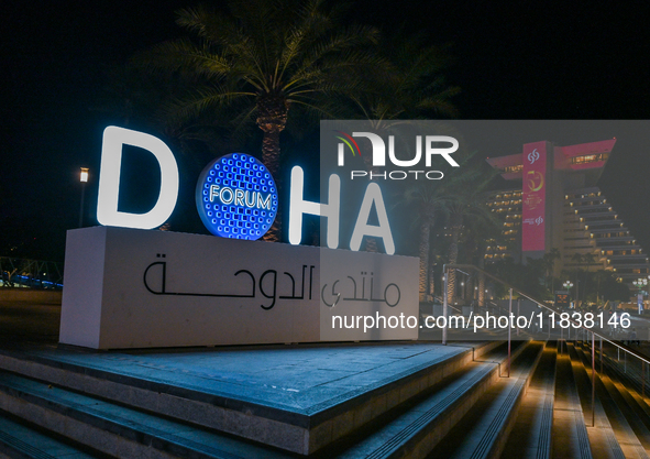 The Doha Forum logo is outside the Sheraton Grand Doha Resort & Convention Hotel ahead of the 22nd edition of the Doha Forum in Doha, Qatar,...