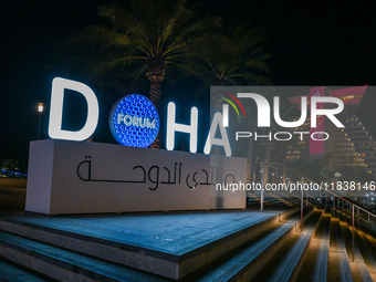 The Doha Forum logo is outside the Sheraton Grand Doha Resort & Convention Hotel ahead of the 22nd edition of the Doha Forum in Doha, Qatar,...