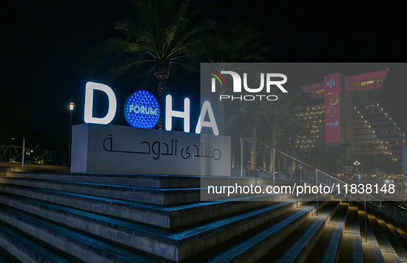 The Doha Forum logo is outside the Sheraton Grand Doha Resort & Convention Hotel ahead of the 22nd edition of the Doha Forum in Doha, Qatar,...