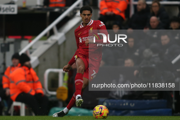 Liverpool's Jarell Quansah participates in the Premier League match between Newcastle United and Liverpool at St. James's Park in Newcastle,...