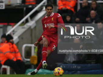 Liverpool's Jarell Quansah participates in the Premier League match between Newcastle United and Liverpool at St. James's Park in Newcastle,...