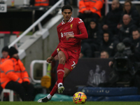 Liverpool's Jarell Quansah participates in the Premier League match between Newcastle United and Liverpool at St. James's Park in Newcastle,...