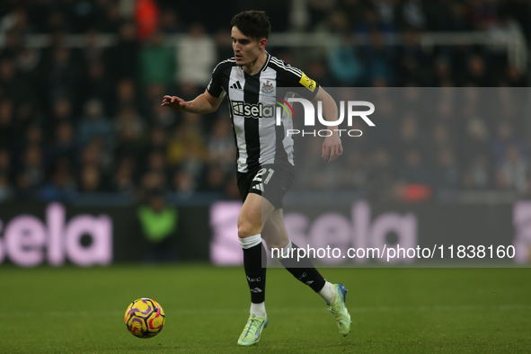 Tino Livramento of Newcastle United participates in the Premier League match between Newcastle United and Liverpool at St. James's Park in N...