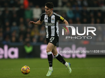 Tino Livramento of Newcastle United participates in the Premier League match between Newcastle United and Liverpool at St. James's Park in N...