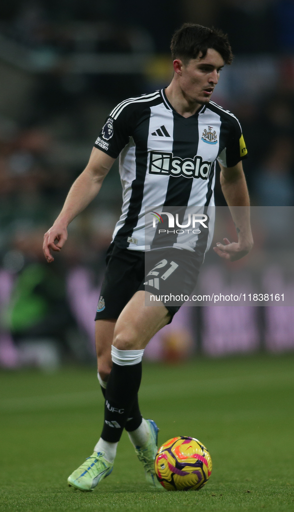 Tino Livramento of Newcastle United participates in the Premier League match between Newcastle United and Liverpool at St. James's Park in N...