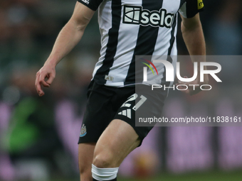 Tino Livramento of Newcastle United participates in the Premier League match between Newcastle United and Liverpool at St. James's Park in N...