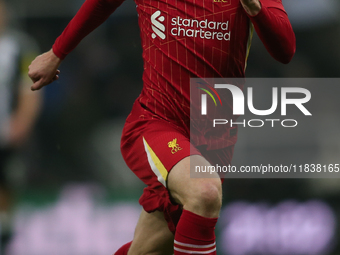 Liverpool's Andrew Robertson participates in the Premier League match between Newcastle United and Liverpool at St. James's Park in Newcastl...