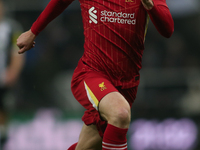 Liverpool's Andrew Robertson participates in the Premier League match between Newcastle United and Liverpool at St. James's Park in Newcastl...