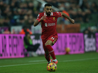 Mohamed Salah of Liverpool plays during the Premier League match between Newcastle United and Liverpool at St. James's Park in Newcastle, Un...