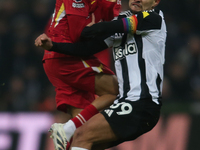 Liverpool's Trent Alexander-Arnold collides with Newcastle United's Bruno Guimaraes during the Premier League match between Newcastle United...