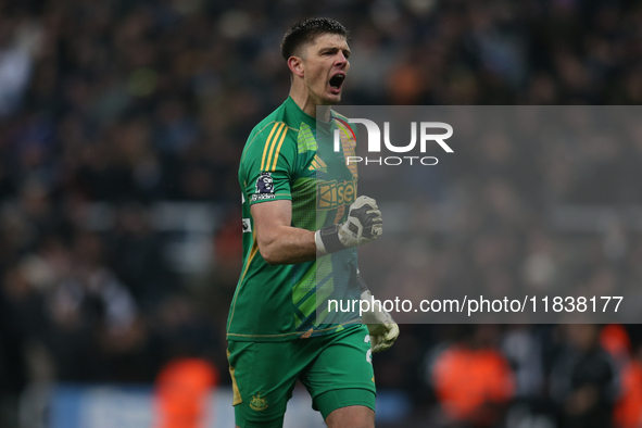 Newcastle United goalkeeper Nick Pope celebrates a goal during the Premier League match between Newcastle United and Liverpool at St. James'...