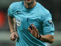 Referee Andy Madley officiates the Premier League match between Newcastle United and Liverpool at St. James's Park in Newcastle, United King...