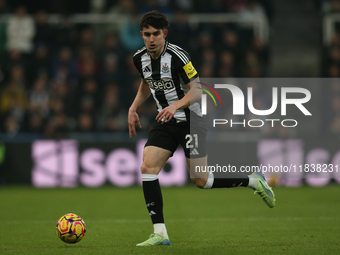 Tino Livramento of Newcastle United participates in the Premier League match between Newcastle United and Liverpool at St. James's Park in N...