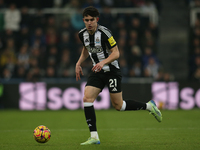 Tino Livramento of Newcastle United participates in the Premier League match between Newcastle United and Liverpool at St. James's Park in N...