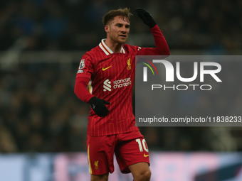 Liverpool's Alexis Mac Allister reacts to a foul during the Premier League match between Newcastle United and Liverpool at St. James's Park...