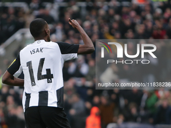 Alexander Isak of Newcastle United celebrates the opening goal during the Premier League match between Newcastle United and Liverpool at St....