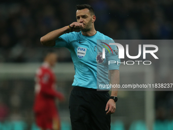 Referee Andy Madley officiates the Premier League match between Newcastle United and Liverpool at St. James's Park in Newcastle, United King...