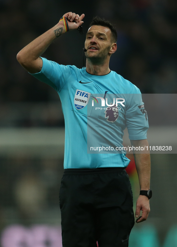 Referee Andy Madley officiates the Premier League match between Newcastle United and Liverpool at St. James's Park in Newcastle, United King...