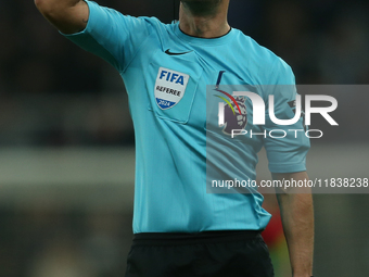 Referee Andy Madley officiates the Premier League match between Newcastle United and Liverpool at St. James's Park in Newcastle, United King...