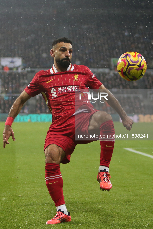 Mohamed Salah of Liverpool plays during the Premier League match between Newcastle United and Liverpool at St. James's Park in Newcastle, Un...