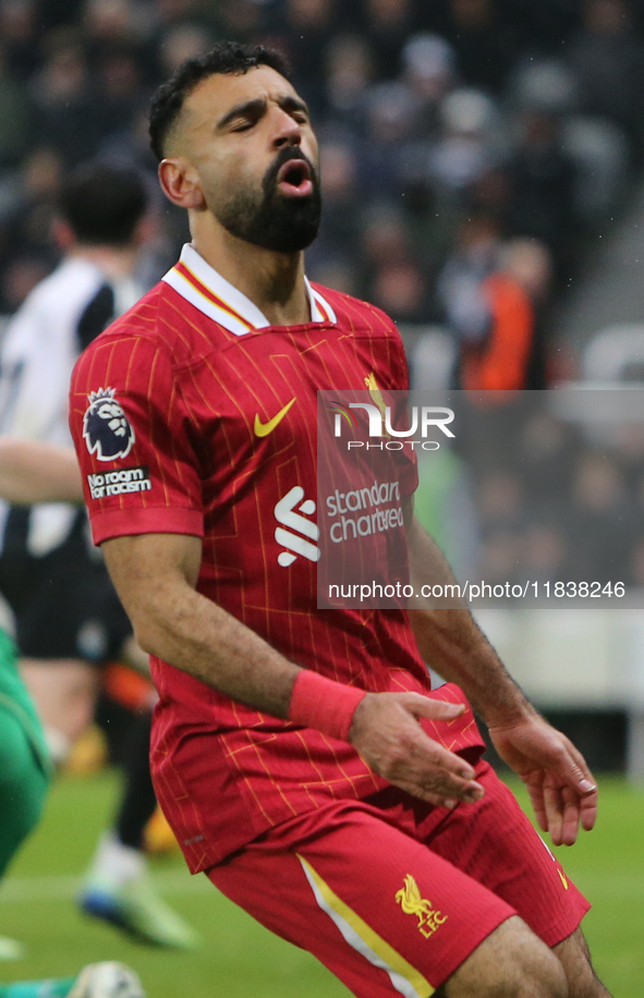 Liverpool's Mohamed Salah shows dejection during the Premier League match between Newcastle United and Liverpool at St. James's Park in Newc...