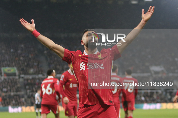 Mohamed Salah celebrates Liverpool's third goal during the Premier League match between Newcastle United and Liverpool at St. James's Park i...