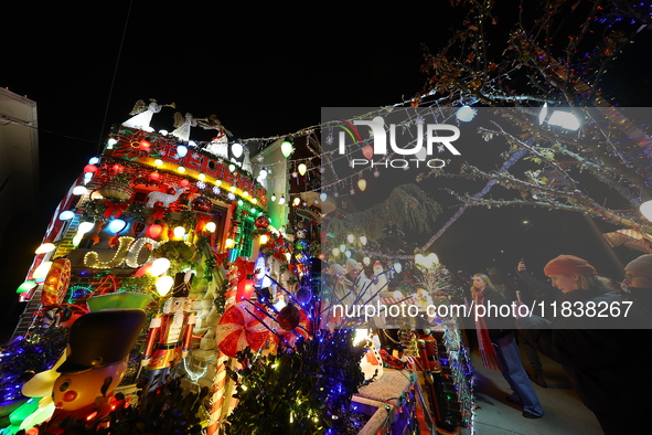 Holiday lights and decorations adorn a home in the Dyker Heights section of Brooklyn, N.Y., on December 4, 2024. Dyker Heights is well-known...