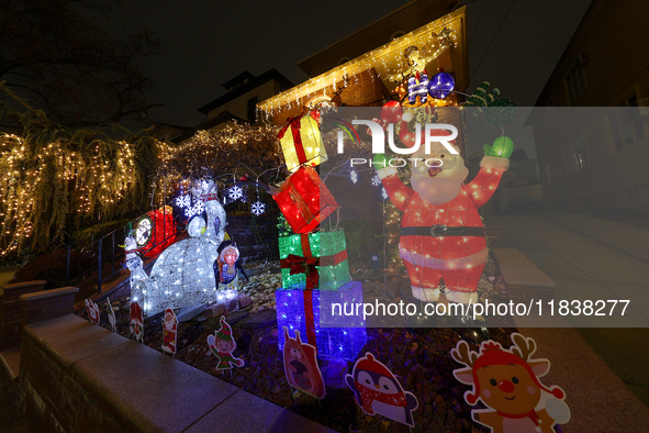 Holiday lights and decorations adorn a home in the Dyker Heights section of Brooklyn, N.Y., on December 4, 2024. Dyker Heights is well-known...