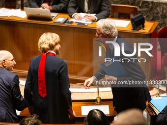 French Prime Minister Michel Barnier is seen during the questions to the government session at the National Assembly in Paris, France, on Ap...