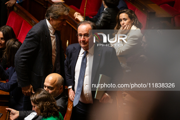 Francois Hollande, deputy of the Socialistes et Apparentes group, is seen during the session of questions to the government in Paris, France...