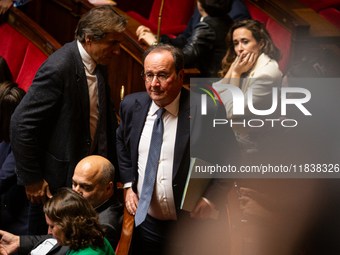 Francois Hollande, deputy of the Socialistes et Apparentes group, is seen during the session of questions to the government in Paris, France...