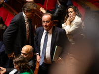 Francois Hollande, deputy of the Socialistes et Apparentes group, is seen during the session of questions to the government in Paris, France...