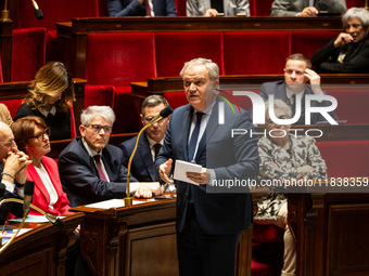 Francois-Noel Buffet, Minister attached to the Prime Minister responsible for Overseas France, speaks during the questions to the government...