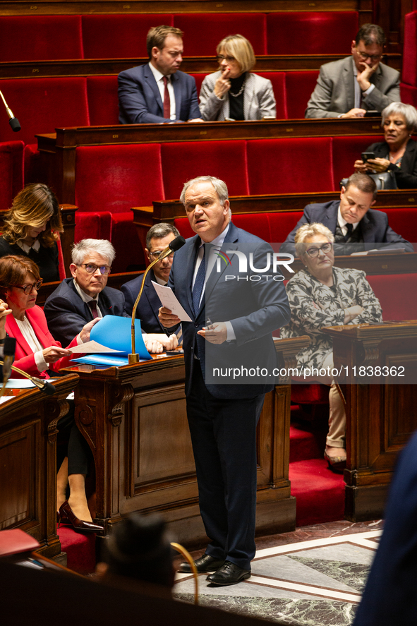 Francois-Noel Buffet, Minister attached to the Prime Minister responsible for Overseas France, speaks during the questions to the government...