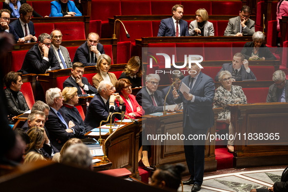 Francois-Noel Buffet, Minister attached to the Prime Minister responsible for Overseas France, speaks during the questions to the government...