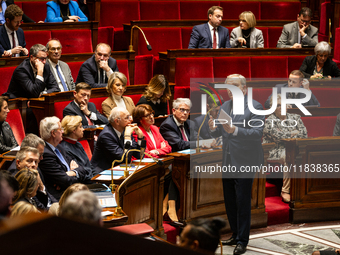 Francois-Noel Buffet, Minister attached to the Prime Minister responsible for Overseas France, speaks during the questions to the government...