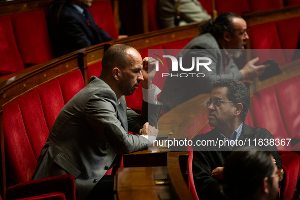 Manuel Bompard (L) and Gabriel Amard (R), deputies of the La France Insoumise - Nouveau Front Populaire group, are seen during the questions...