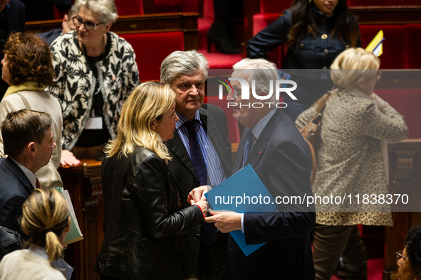 French Prime Minister Michel Barnier and Yael Braun-Pivet, president of the French National Assembly, dialogue at the end of the session of...