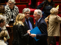 French Prime Minister Michel Barnier and Yael Braun-Pivet, president of the French National Assembly, dialogue at the end of the session of...